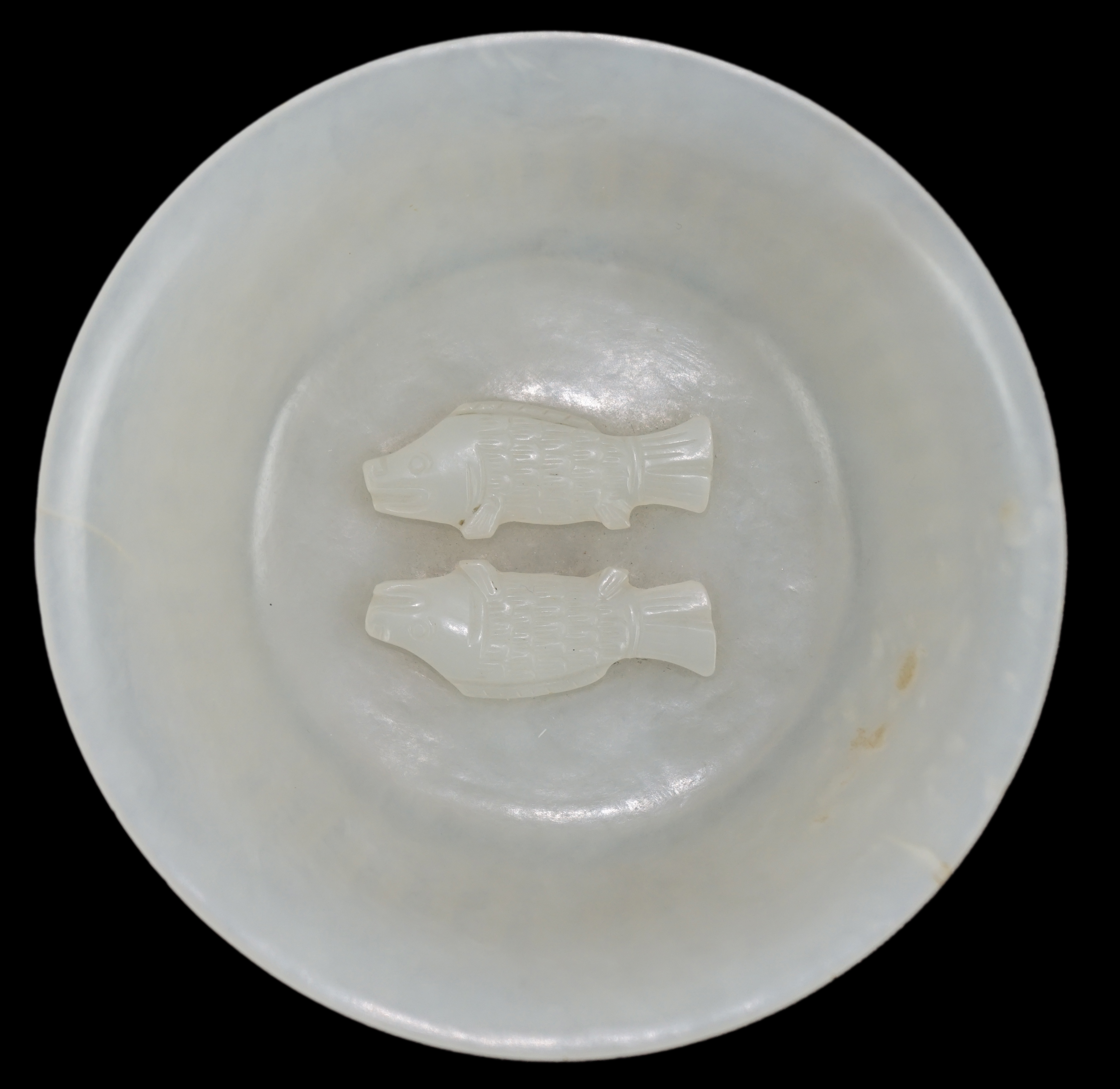 A fine Chinese white jade 'twin-fish' bowl, Qianlong period (1736-95)